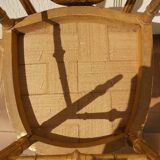 Pair of chairs with a golden lyre