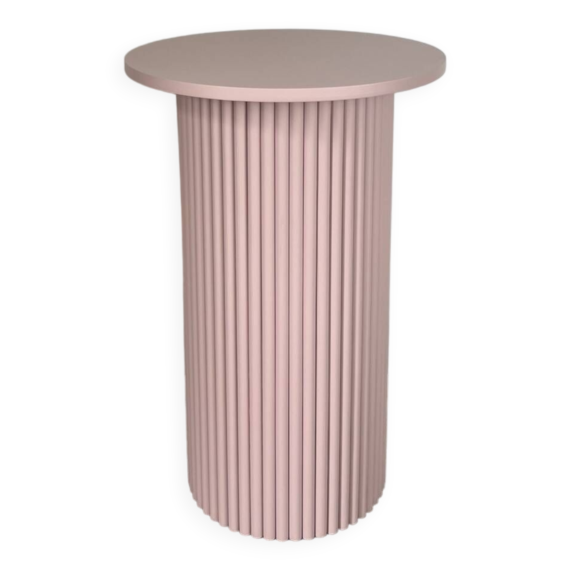 round and fluted bedside table in dusty pink
