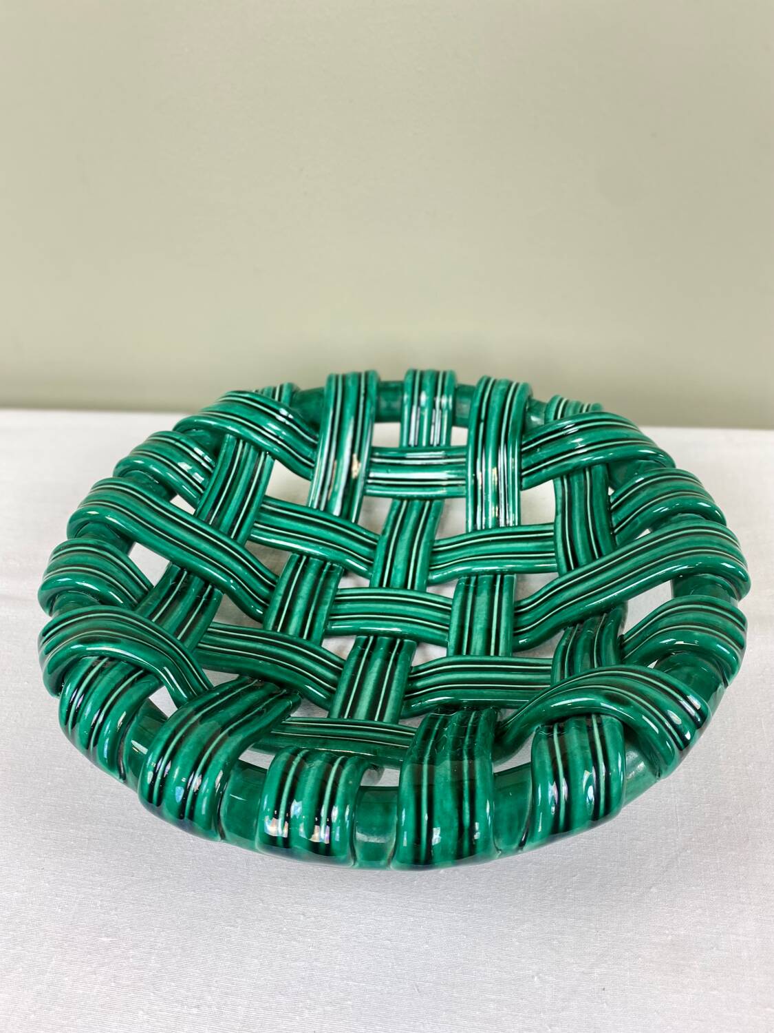 Braided ceramic cup