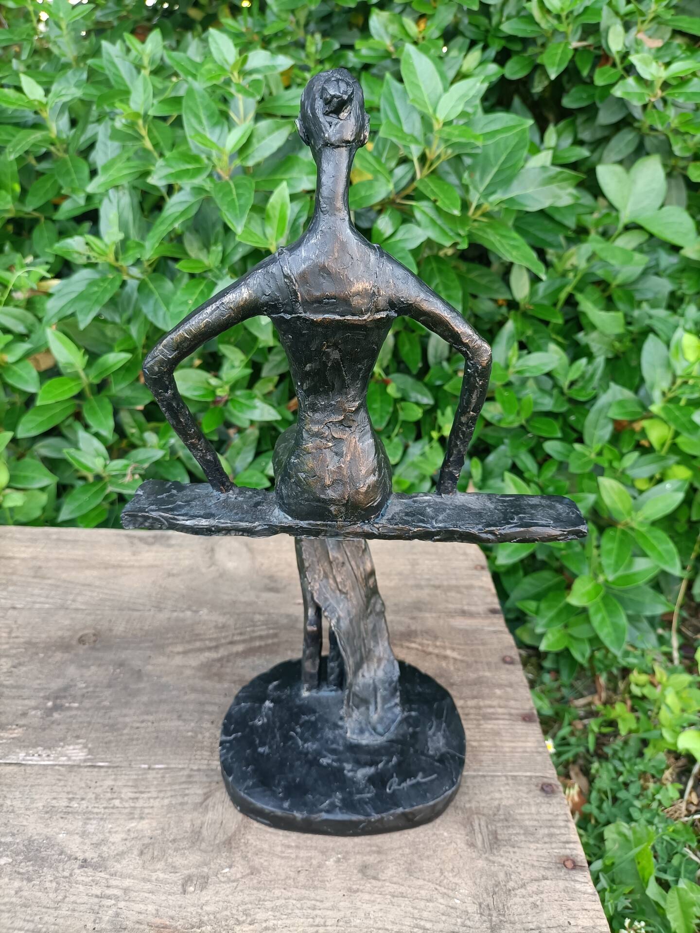 Sculpture of a dancer on a swing signed by Raphaël