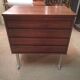 Commode en palissandre et métal brossé