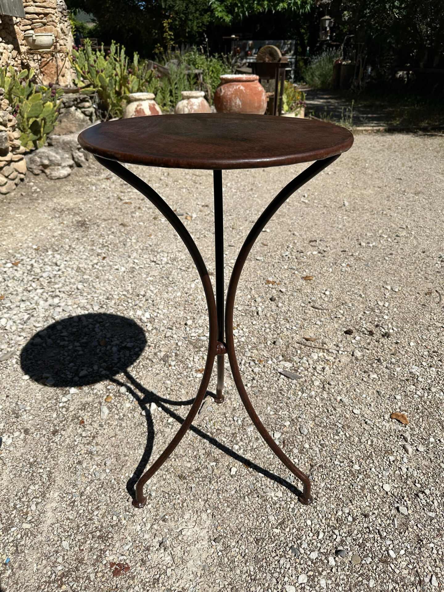 Artisanal wrought iron side table
