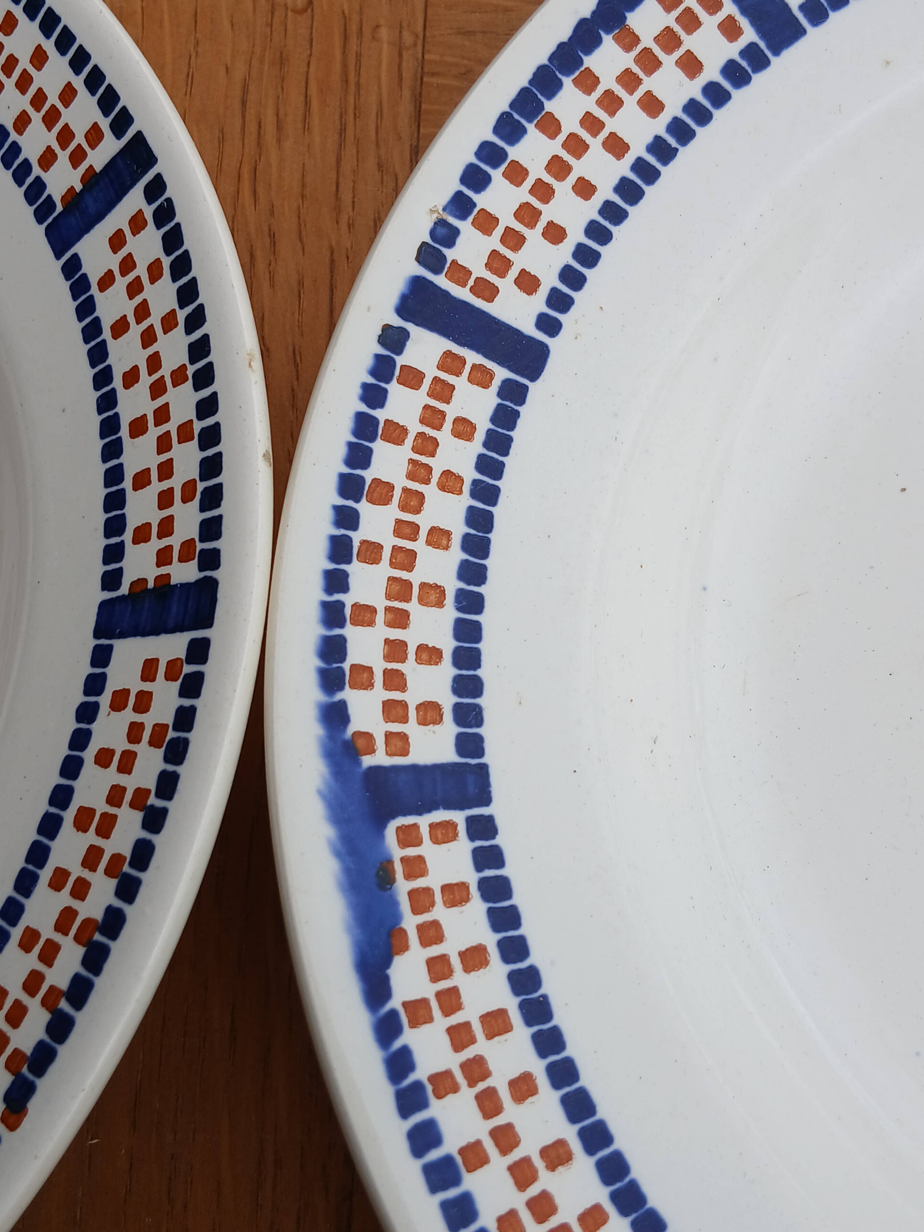 Six antique soup plates