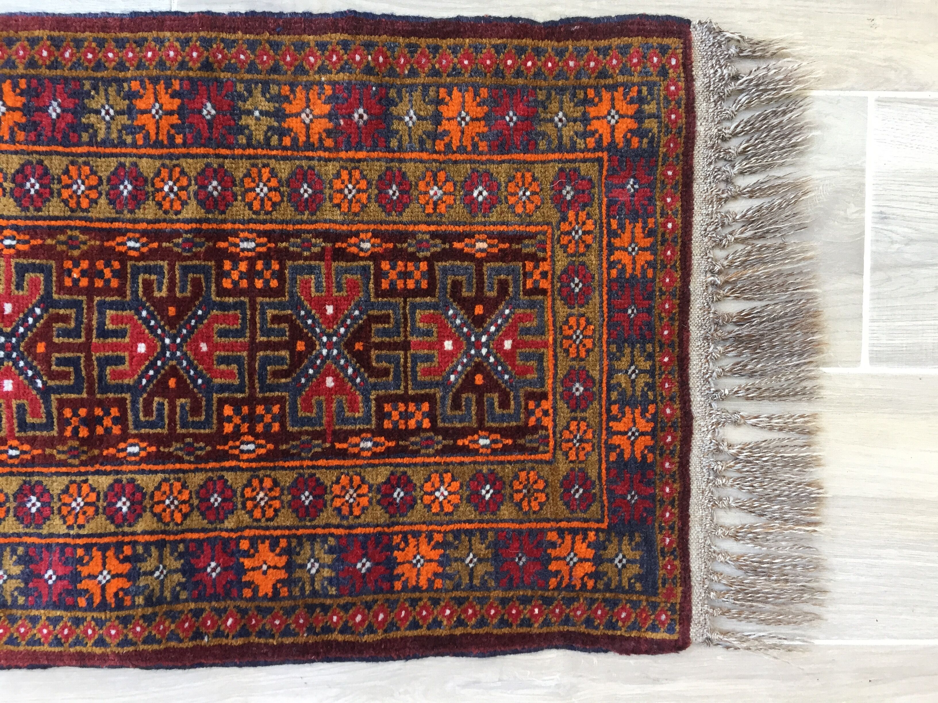 Small oriental wool rug - 80 x 46cm