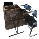 Dining table set with 6 Pieff chairs.