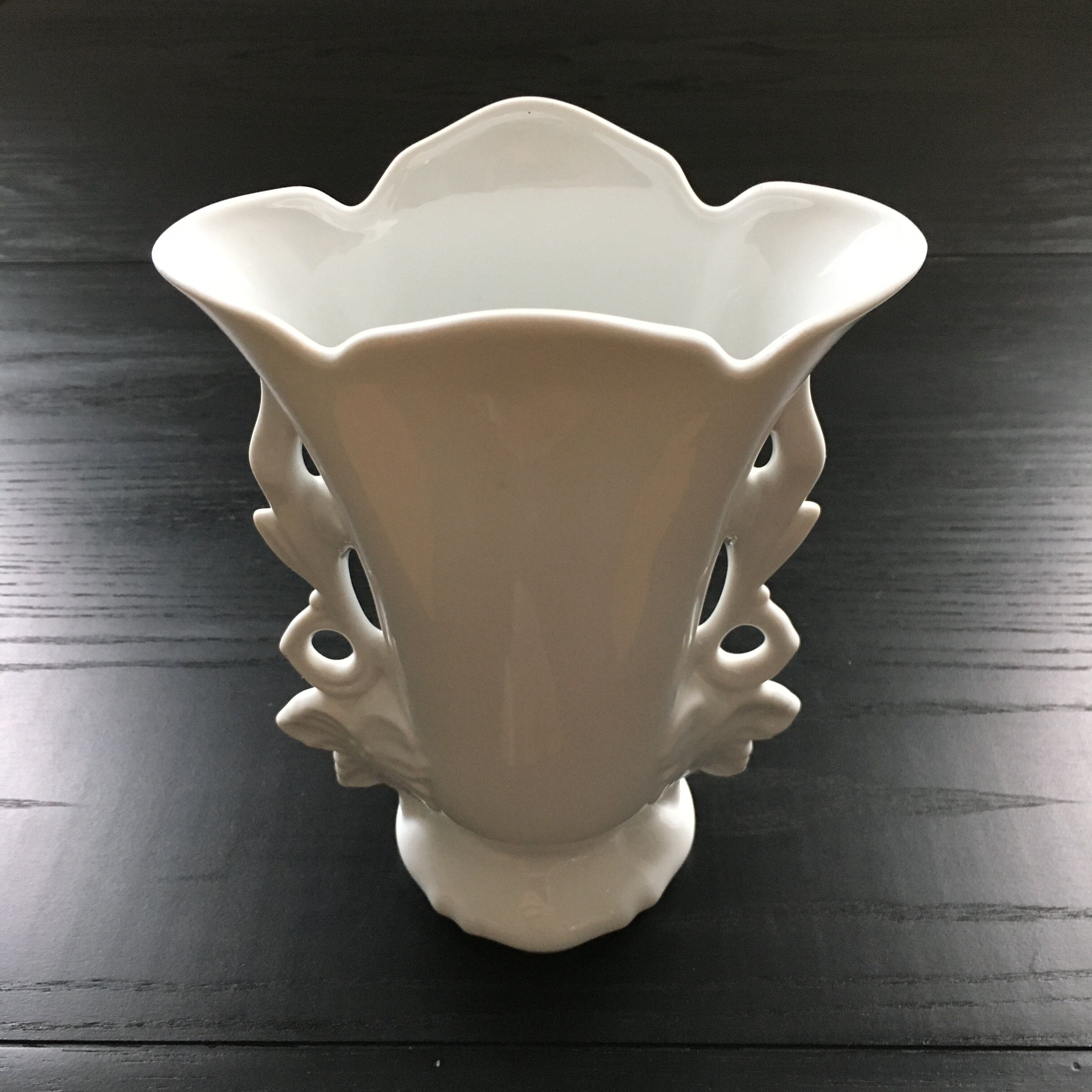 White vase flowery handles