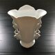 White vase flowery handles