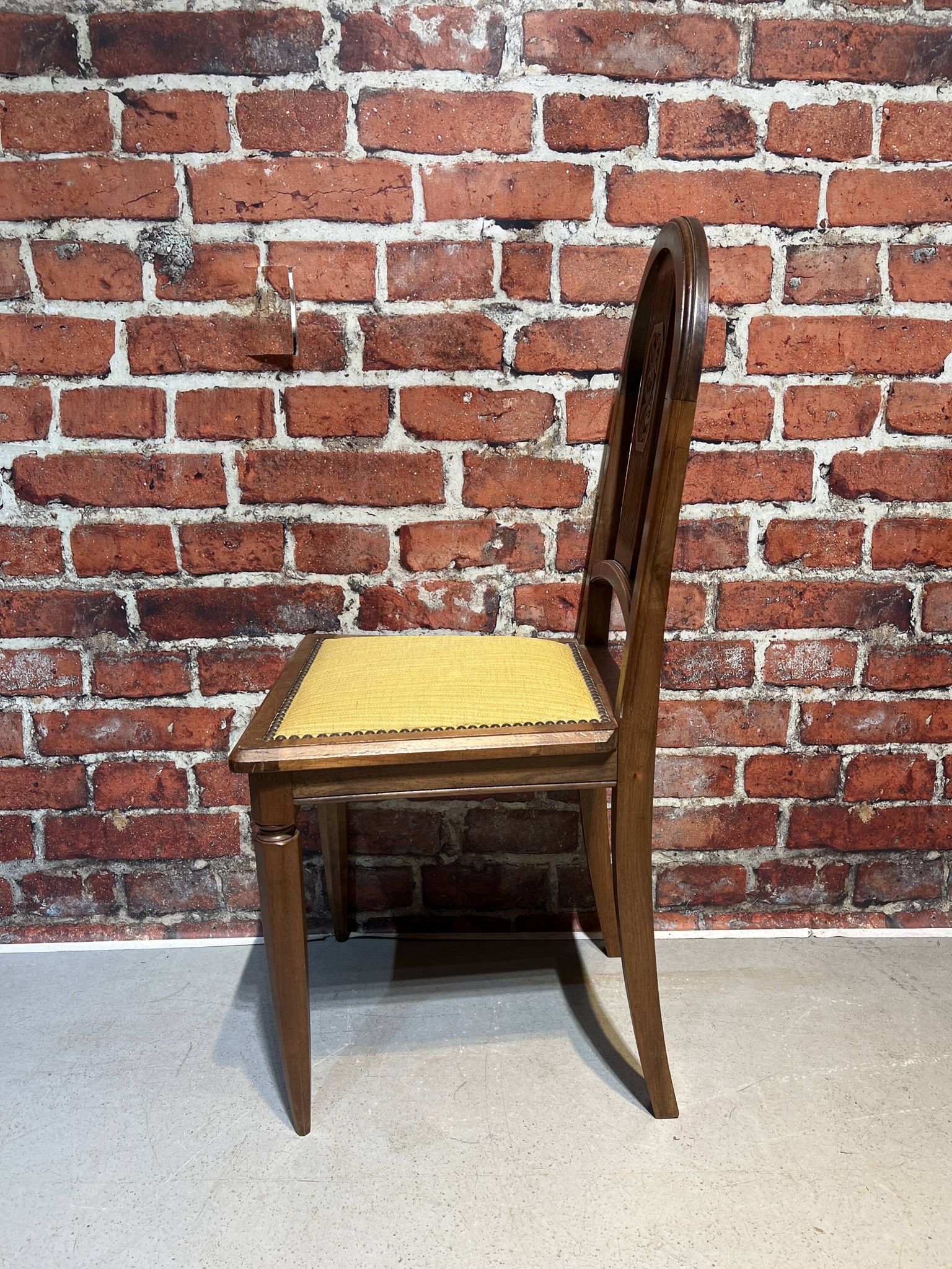 Set of a chair and an armchair in wood and yellow fabric