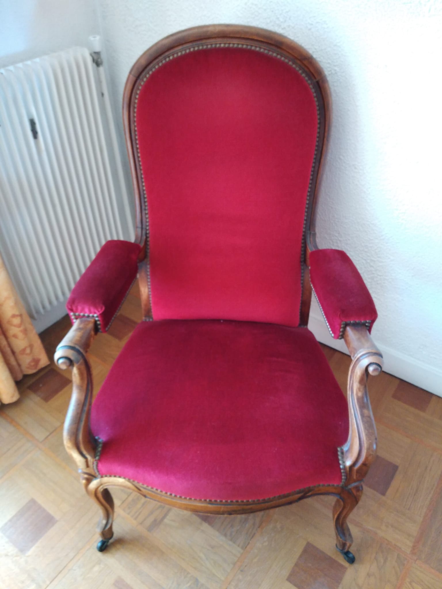 Armchair with its matching footrest