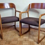 Pair of Baumann armchairs, model "sled", 1960