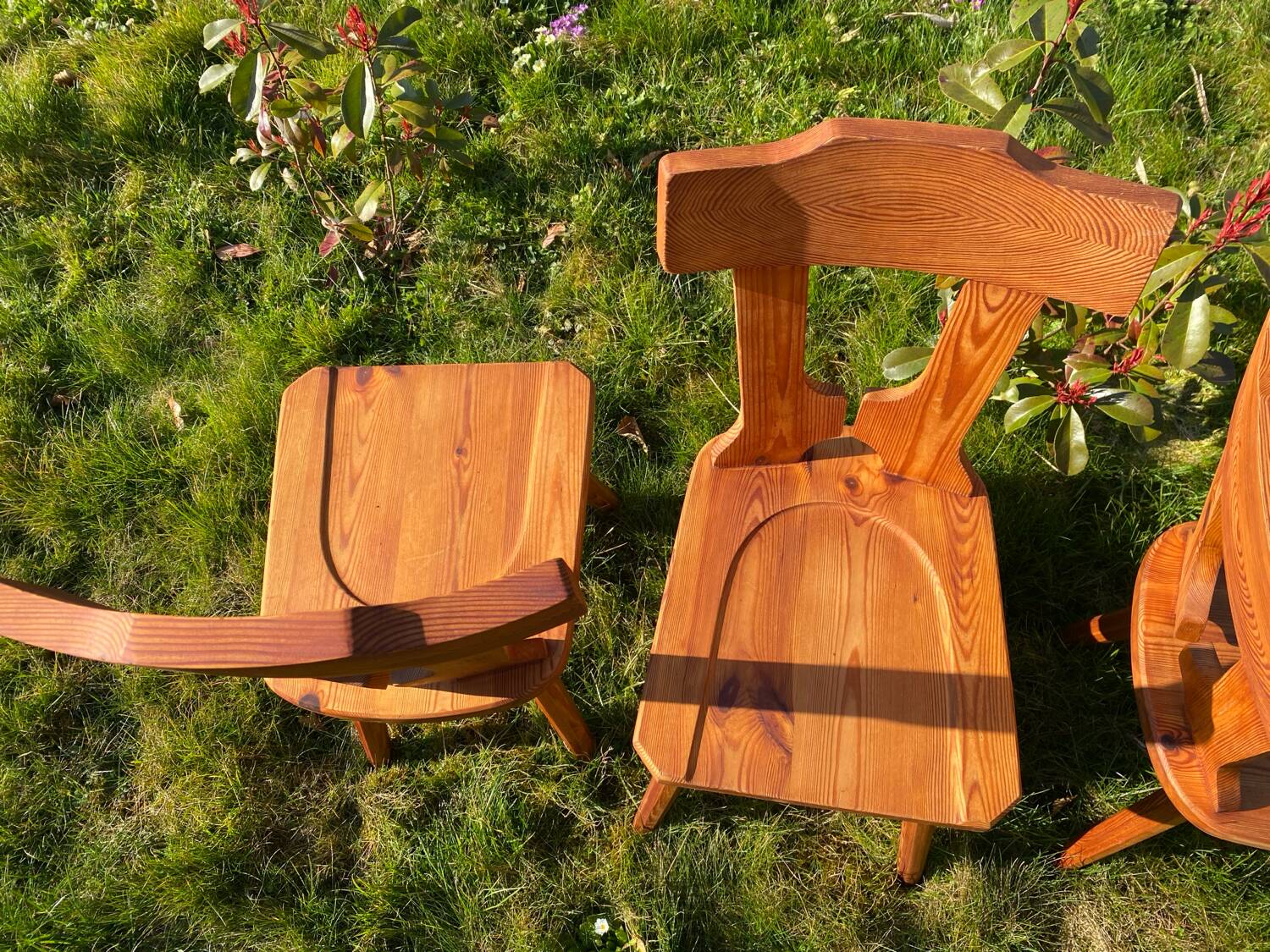 Three solid wood chairs