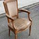 Solid wood and velvet armchair in Louis XVI style