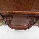 Rectangular wooden suitcase covered with leather