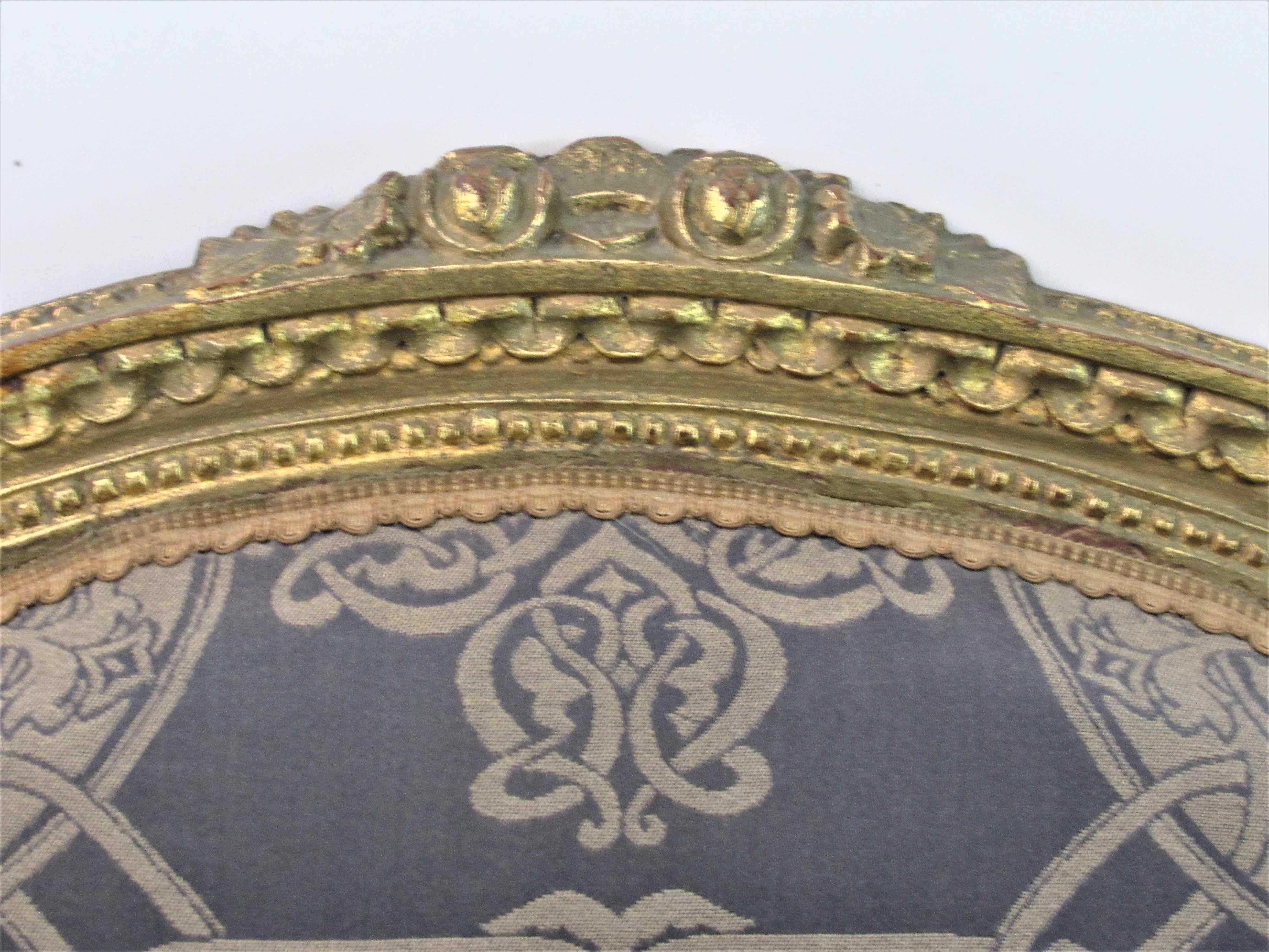 4 armchairs and a gilded wooden sofa Louis XVI style