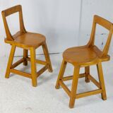 Pair of brutalist wooden back stools. France, circa 1960