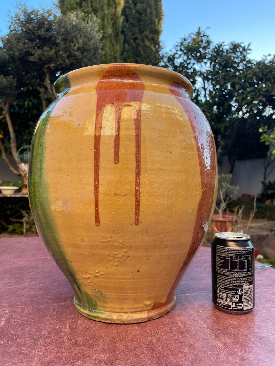 Old glazed terracotta jar