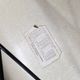 Eames lounge chair white fibre parchment base cat’s cradle Herman Miller