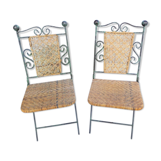 Pair of foldable wrought iron and rattan chairs