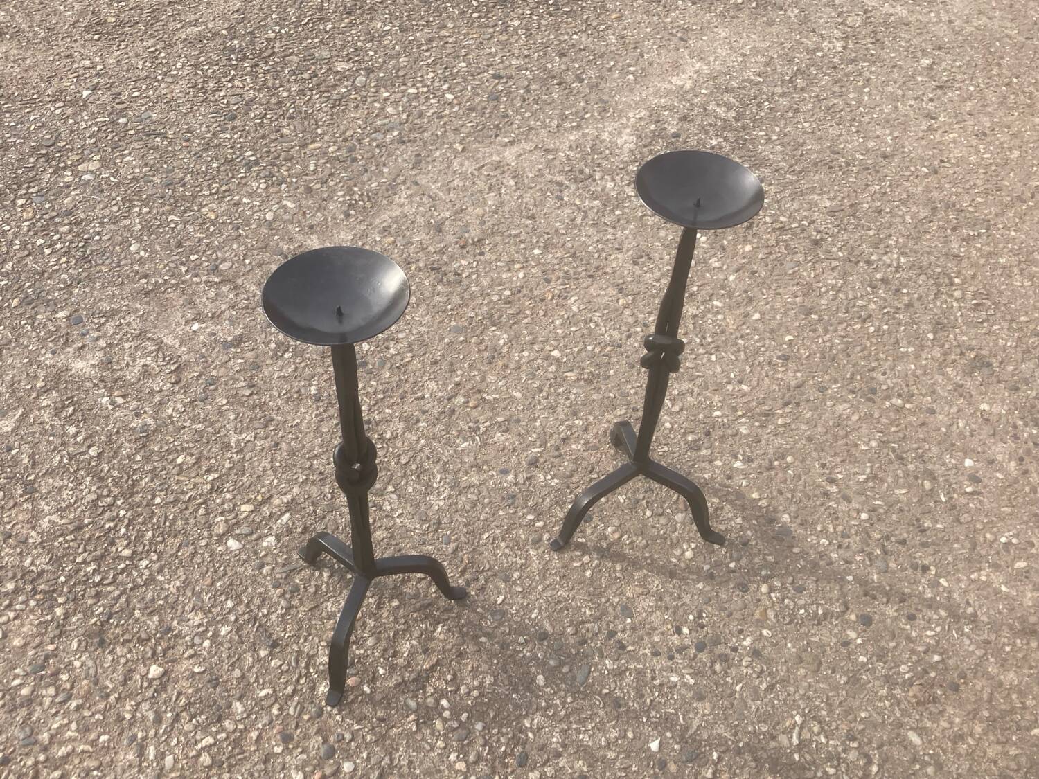 Pair of wrought iron candlesticks