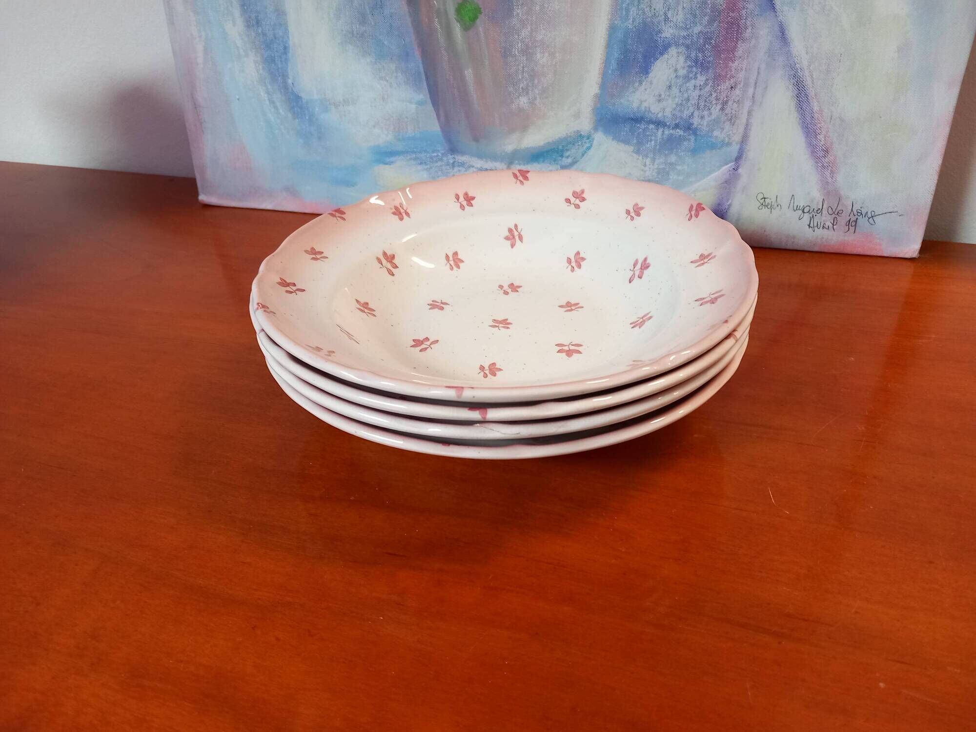Set of 4 antique deep plates from St Amand in the "Vine Leaves" pattern.
