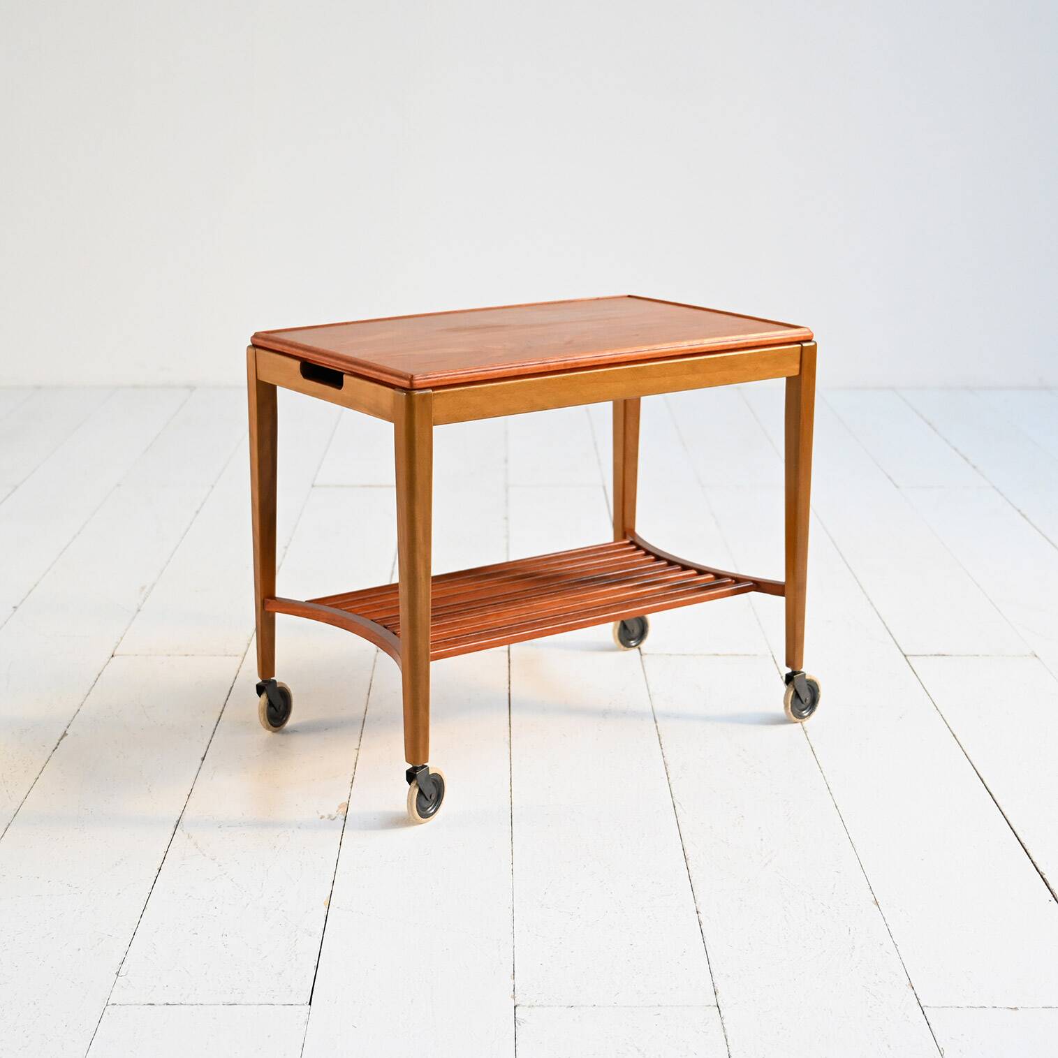 Mid-century Northern European serving trolley in teak and birch, 1950s–1960