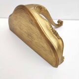 Small golden console