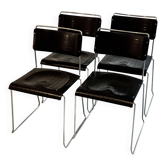 4 Spilimbergo chairs from Italy in chrome steel and black plastic.