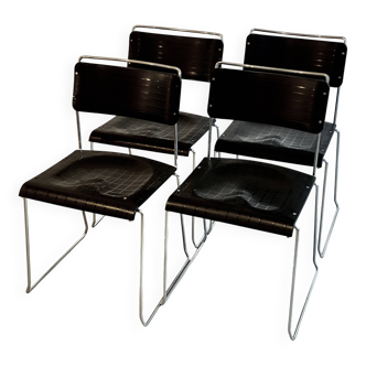 4 Spilimbergo chairs from Italy in chrome steel and black plastic.