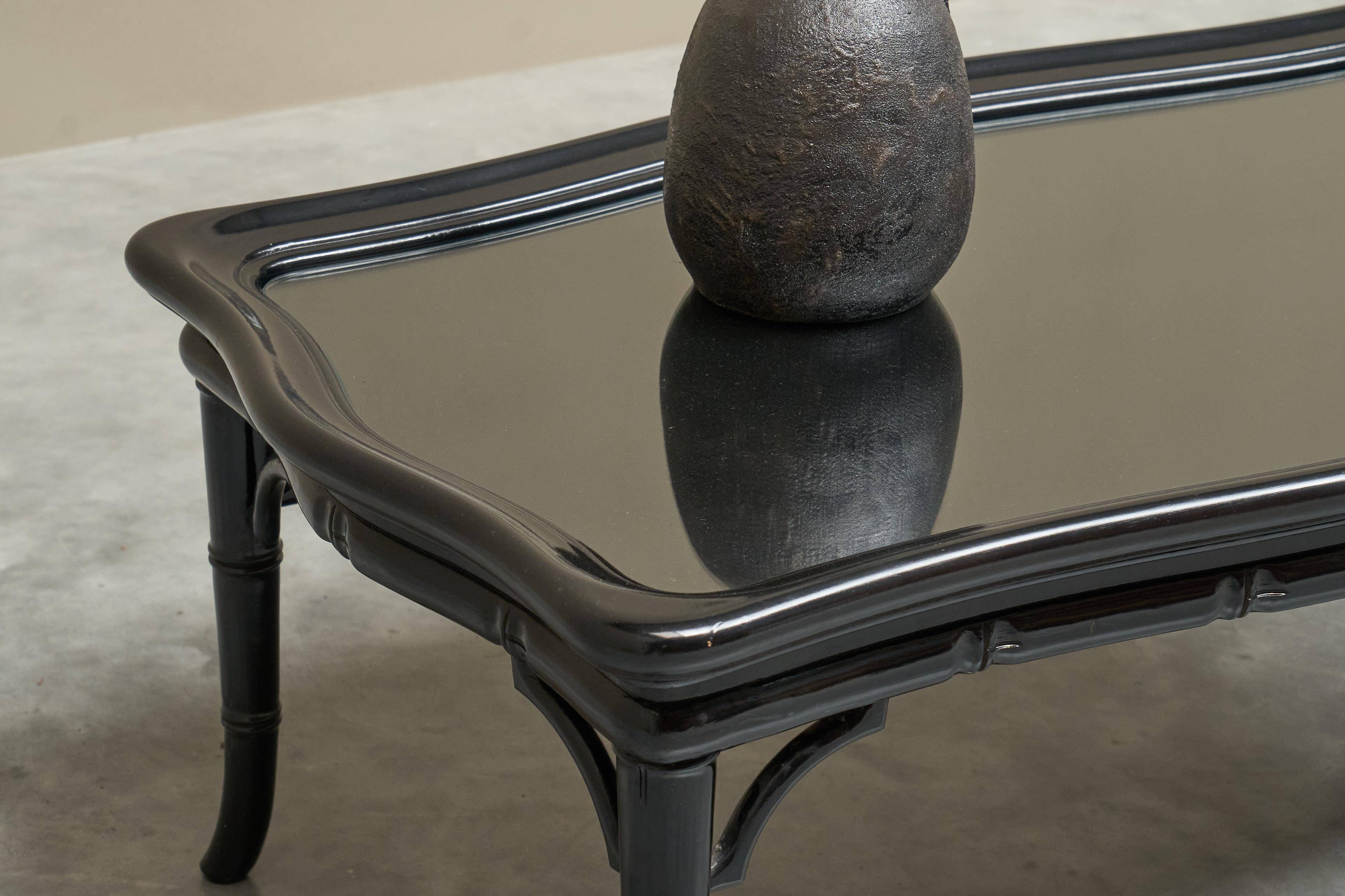 Coffee table in artificial bamboo, black lacquered wood and glass, 1960s.