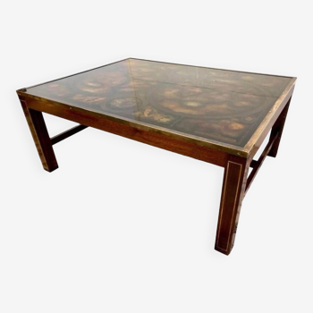 Coffee table in exotic wood, brass trim and planisphere under glass.