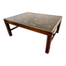 Coffee table in exotic wood, brass trim and planisphere under glass.