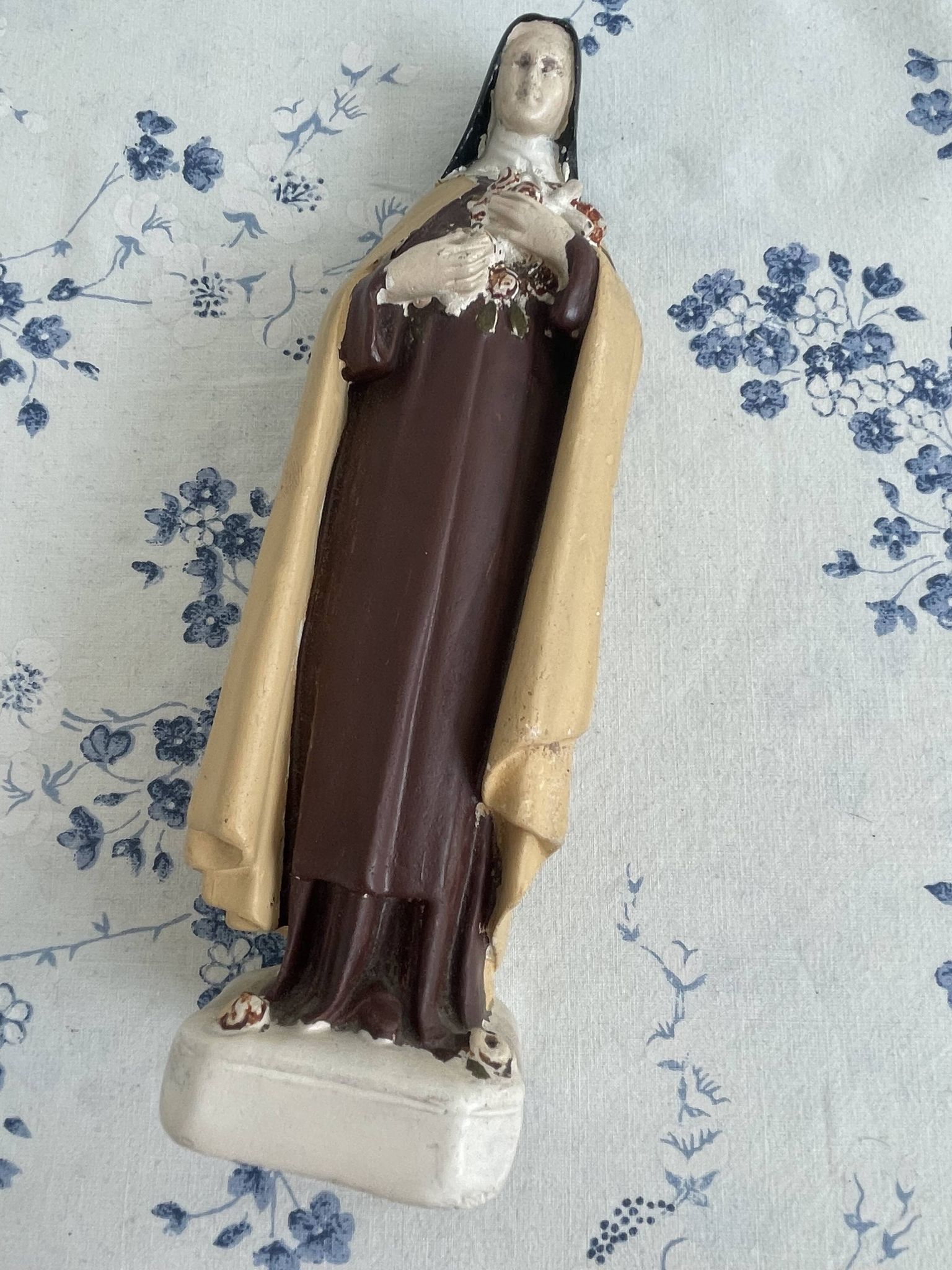 Antique statue of Saint Therese of Lisieux, religious plaster figurine