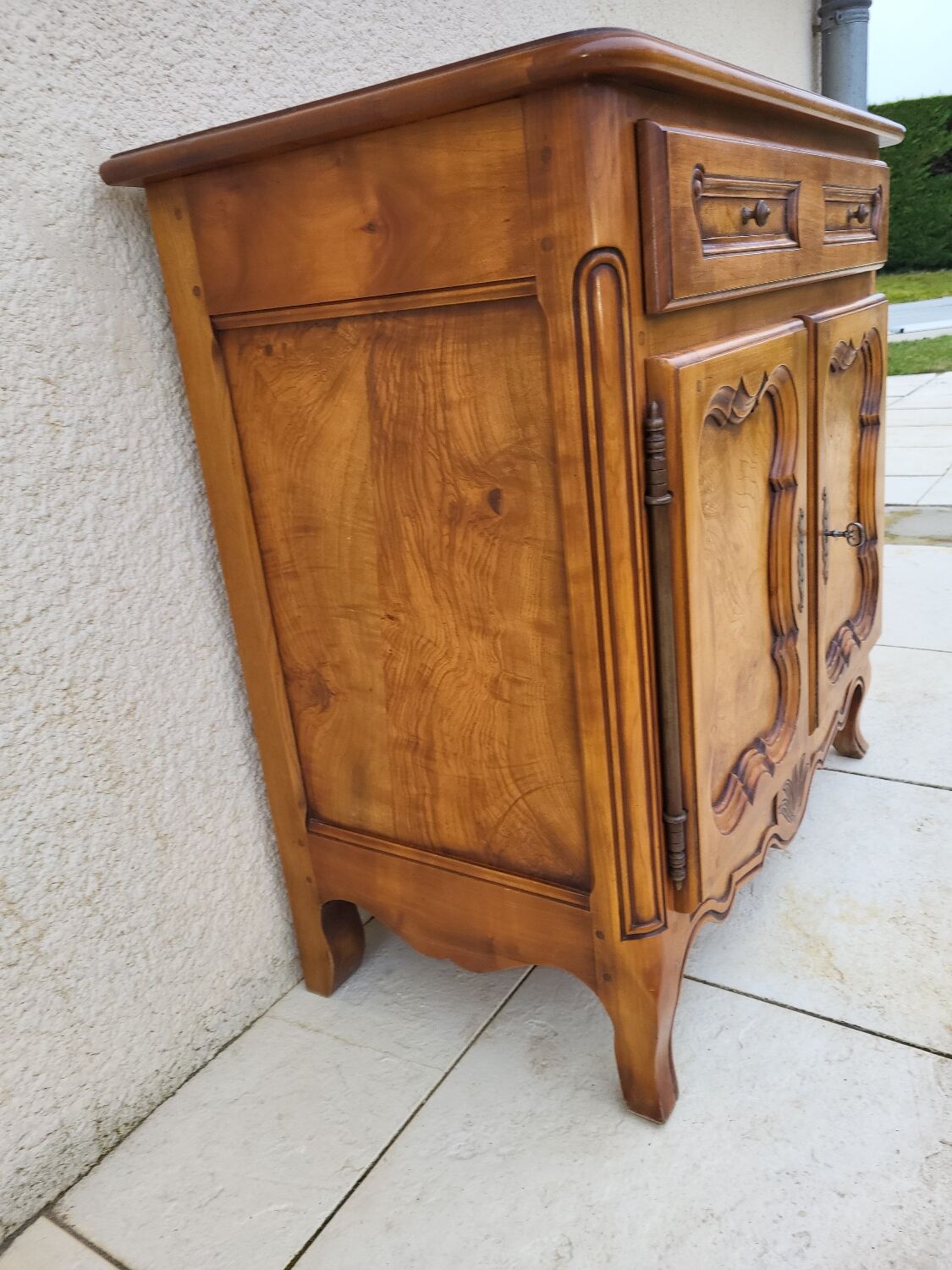 Small piece of furniture in cherry wood.