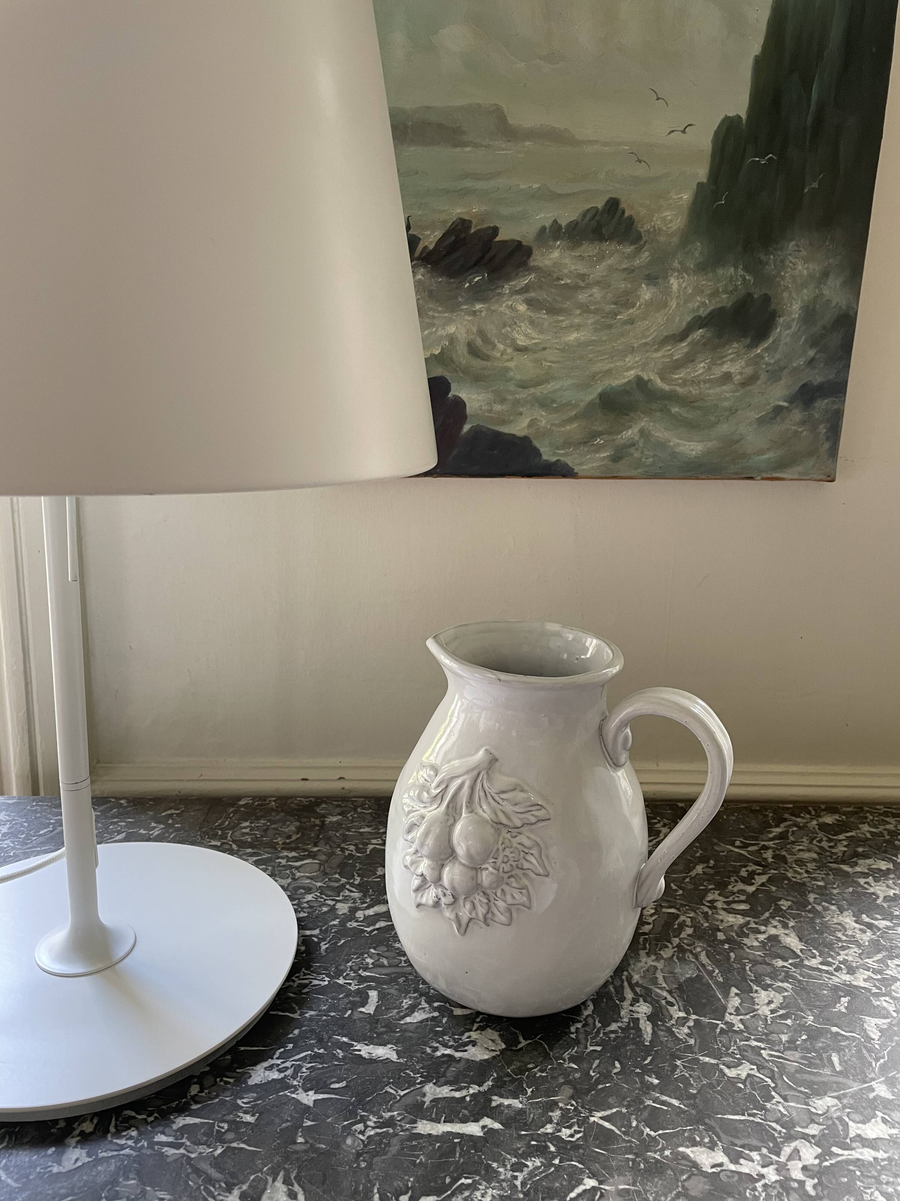 Pitcher in dabbling cherry decoration