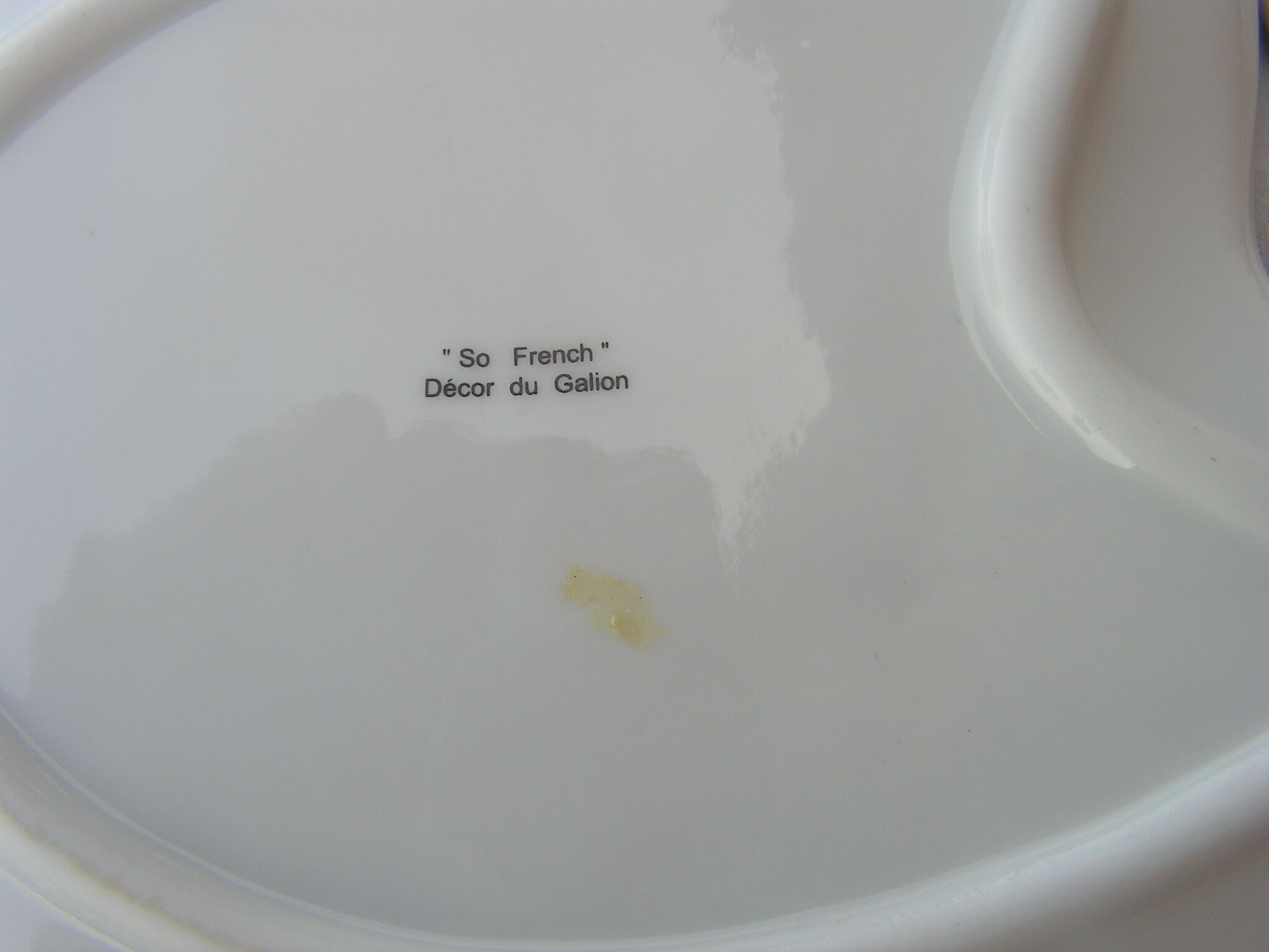 So french design porcelain cup and under cup