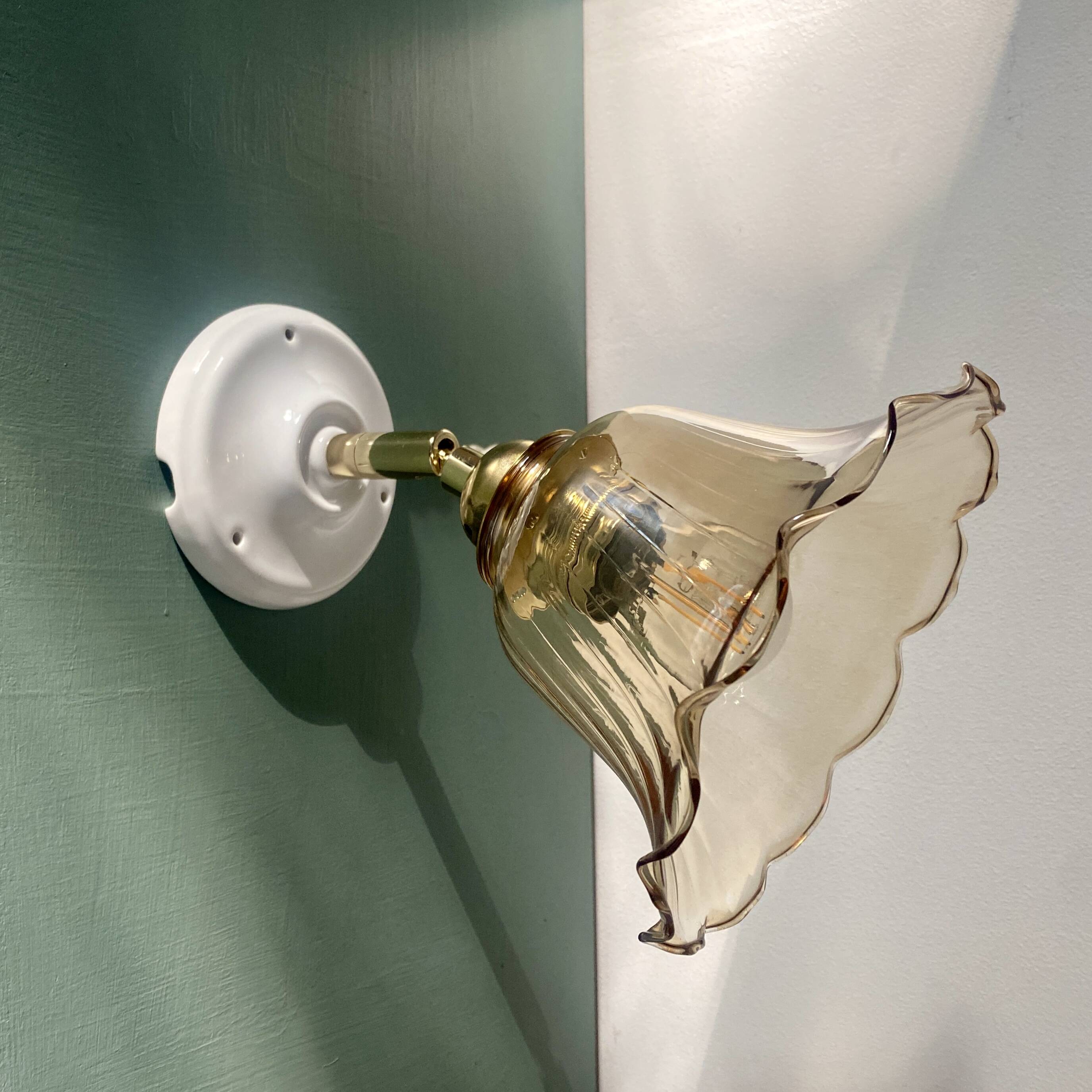 Vintage tulip wall light in amber glass