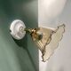 Vintage tulip wall light in amber glass