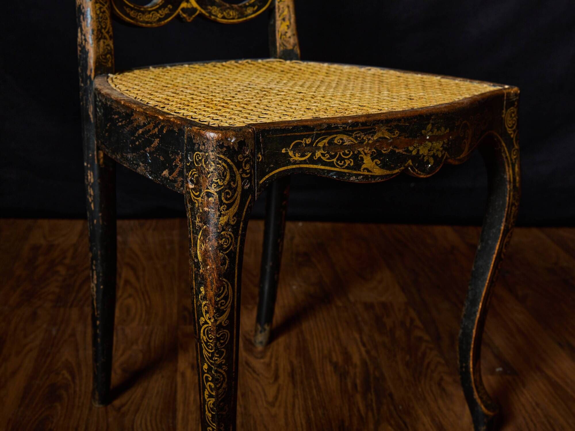 Antique black and gold lacquered chair – Napoleon III style – caned seat