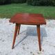 Extendable table with compass legs