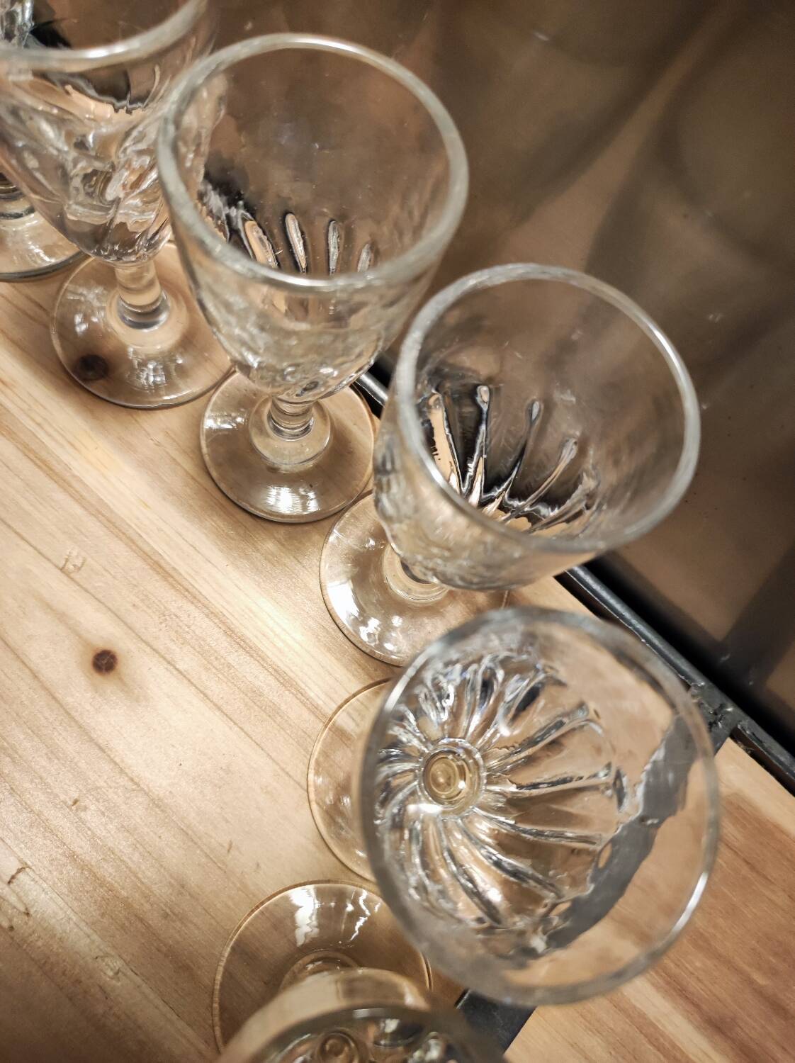 12 small twisted bistro glasses, 19th century