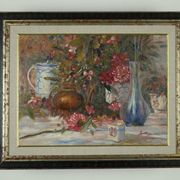 Still life with pink flowers and blue pots.
