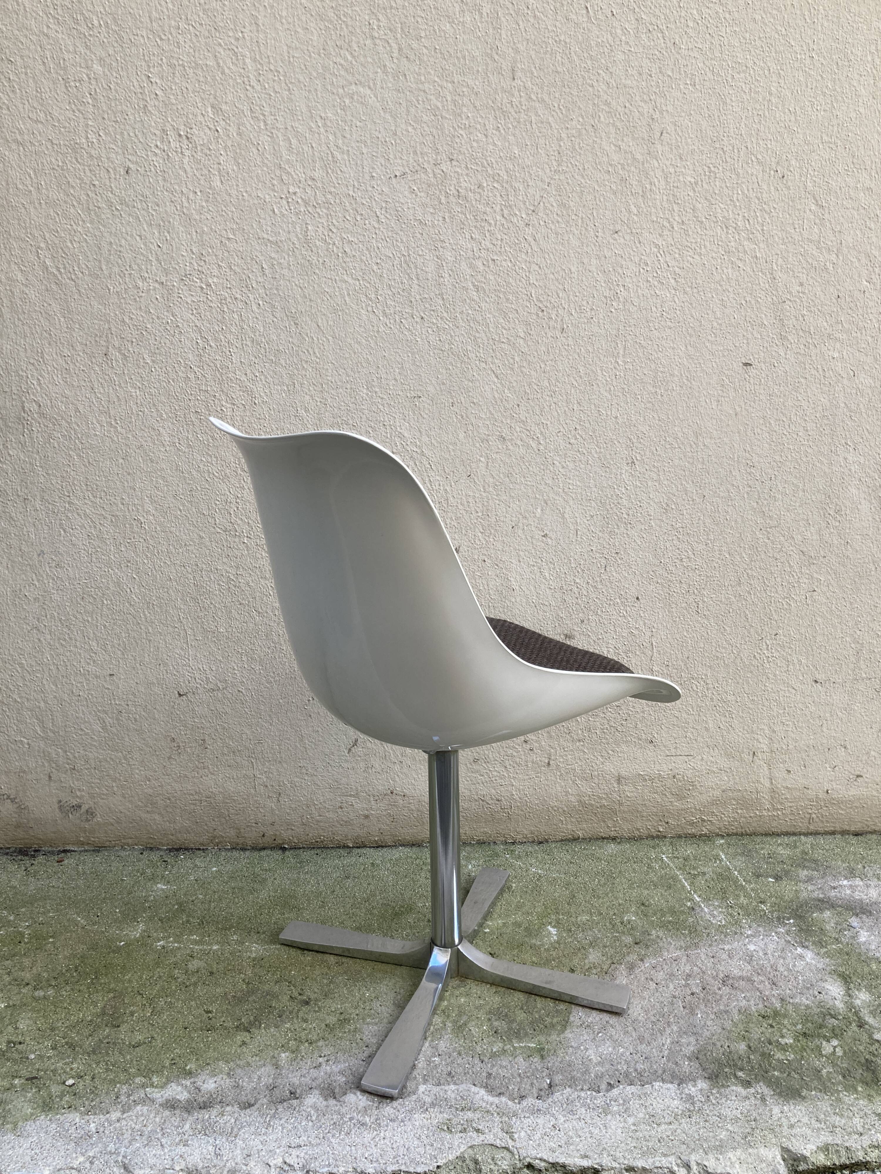 Roche Bobois tulip chair in moulded plastic with a chrome star base.