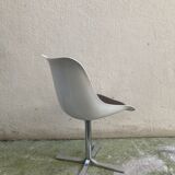 Roche Bobois tulip chair in moulded plastic with a chrome star base.