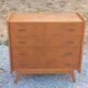 Commode vintage en chêne blond pieds compas 4 tiroirs 1950