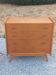Commode vintage en chêne blond pieds compas 4 tiroirs 1950