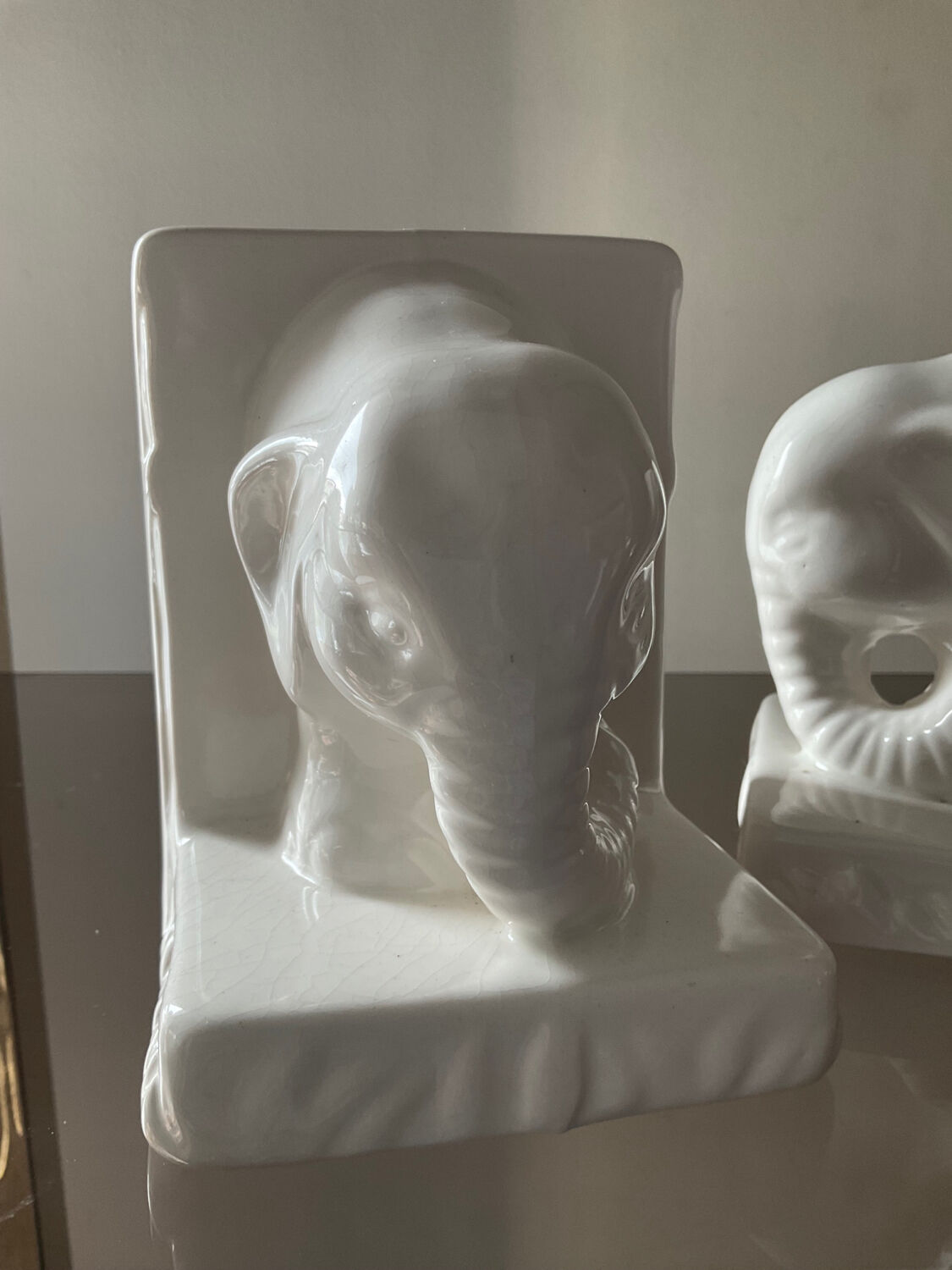 Pair of vintage enamelled ceramic elephant bookends