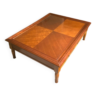 Wooden coffee table with glass top