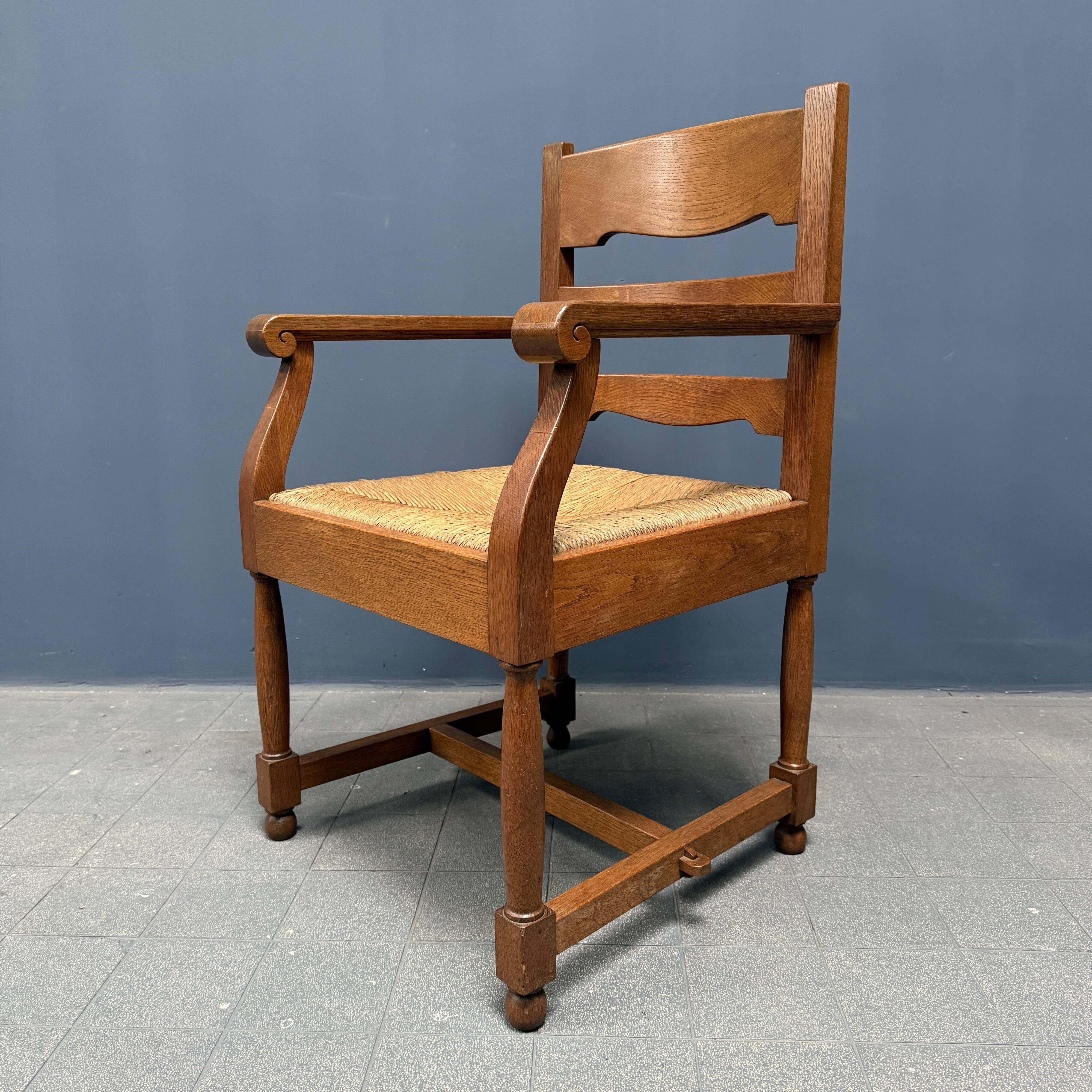 Set of two Dutch oak armchairs with rush seats