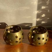 Pair of brass candle holders