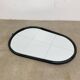 Oval mirror from the 1950s, wrought iron and brass.
